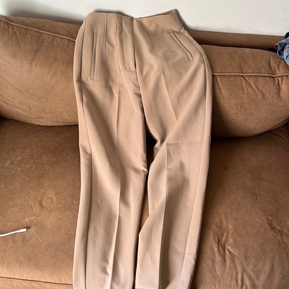 Tan trousers never worn